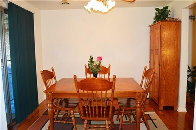 New hardwoods continue in the dining room which le