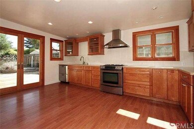 Cherry cabinets and Caesarstone counters