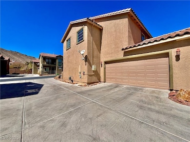 View of home's exterior featuring stucco siding, a