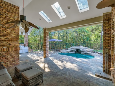 Covered patio with skylights have wonderful views
