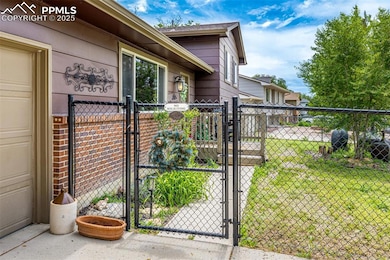View of home's exterior featuring a gate