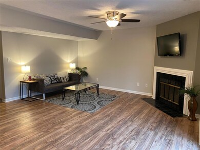 Beautiful Spacious Living Room with Fireplace and 