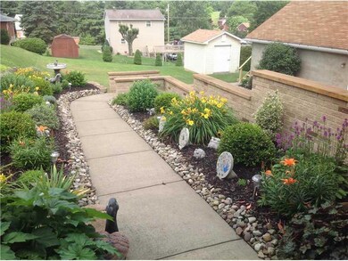 Yard/Garden. CONCRETE WALK WAYS SURROUNDING THE PR