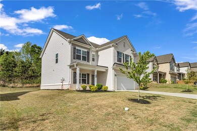 Traditional-style house featuring brick siding, a 