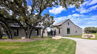 Modern inspired farmhouse with a front yard