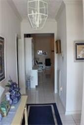 Nice foyer has bedrooms on either side