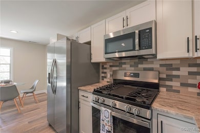Kitchen with S/S appliances with stainless steel f