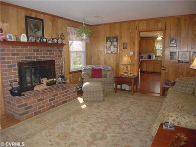 Other - Family room with brick fireplace.