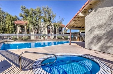 Community pool featuring a patio area and a commun