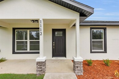 870 NW 69th St, Ocala, FL 34475 - photo 4