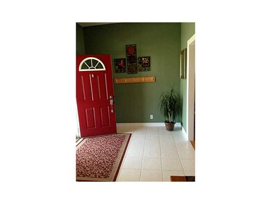 Entryway. Large open entry way with ceramic tile