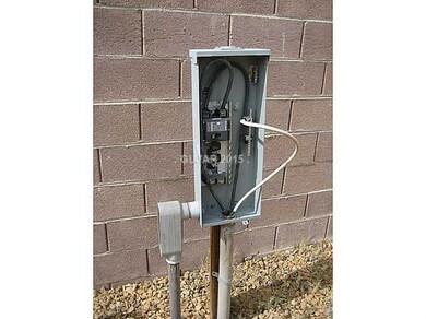 Property Photo. Damaged electrical panel