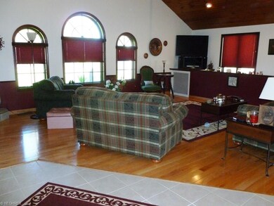 Great Room added on in 2000, open with soaring cei