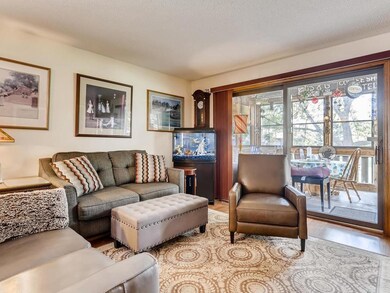 Living Room opens to 3-Season Porch overlooking po