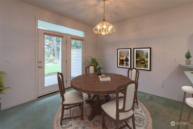 Dining just off the kitchen and entrance to the patio