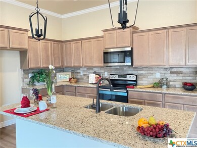 Cook's delight kitchen boasts a bevy of granite to