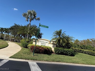 Community sign featuring a yard
