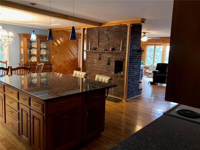 Kitchen with large granite island.