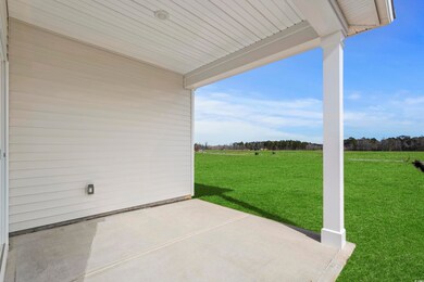 View of patio with a rural view