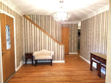 17 x 11 Formal entry way with designer wallcoverin
