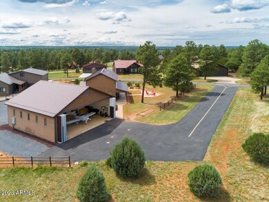 Aerial back of home w/taxiway