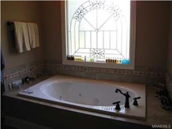 Luxurious Master Bath with Garden Tub and Large Wi