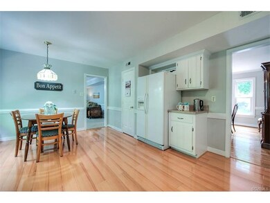View of kitchen looking into the family room.  Not