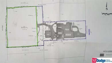The green outline is the land that is included in this lot.