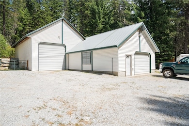Oversized detached garage/shop for the outdoor enthusiast/hobbyist.  
