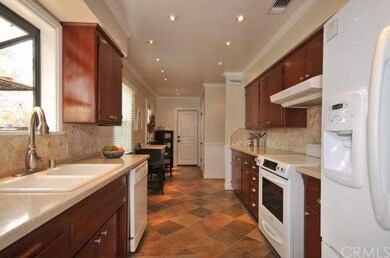 Updated kitchen with Silestone countertops & trave