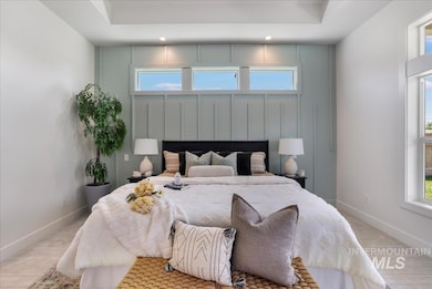 Carpeted bedroom with recessed lighting