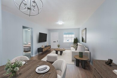 Living/dining virtually staged.