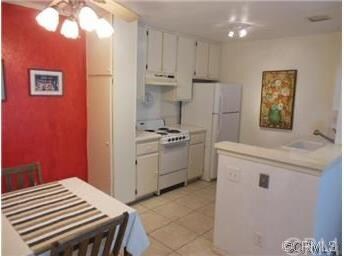 DINING AREA LOOKING AT KITCHEN