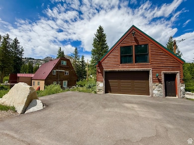 Garage featuring driveway