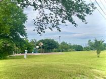 View of property's community featuring a yard and
