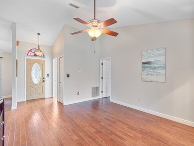 LIVING ROOM AND FOYER