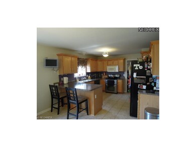 Very large eat in kitchen, oak cabinets with  crow
