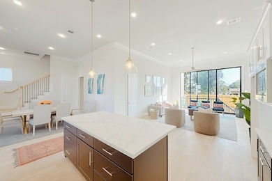 Want Openness?  12 FT Ceilings dressed in Double Crown Molding - Wide Plank Wood Floors