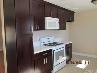 Kitchen has nice stove and microwave.
