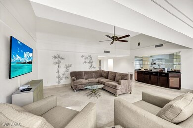 Living area with baseboards, lofted ceiling, ceili