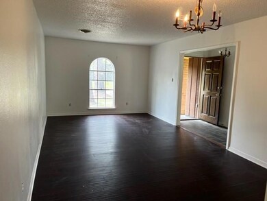 Formal dining/living room.  Newer flooring.