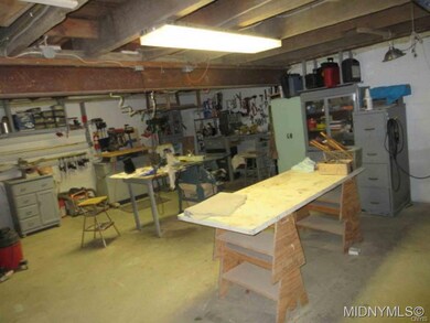 Bsmt workshop w/ pellet stove