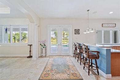 Entry way to the pool and Lanai with the breakfast bar on the right
