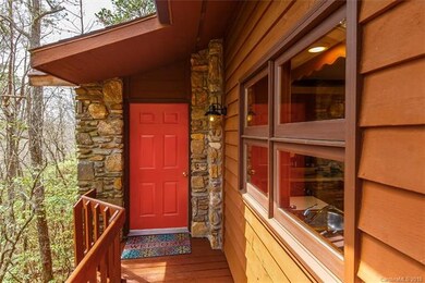 Wood siding and a rock entry welcomes you home....