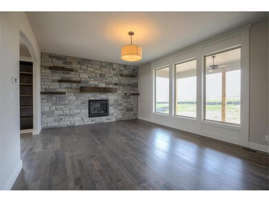 Loads of Light and Stone wall with Floating Shelve