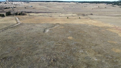 Aerial view of property's location with rural landscape