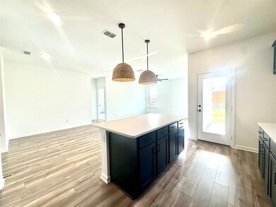 Kitchen featuring light wood-style floors, visible
