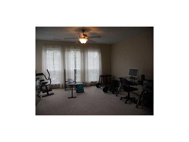 Family Room-L1. Den/office.  3 large windows