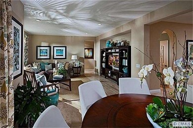 Living and dining area (photo is of model home and