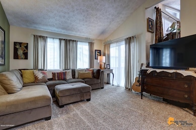 Huge living room w/ SW facing windows